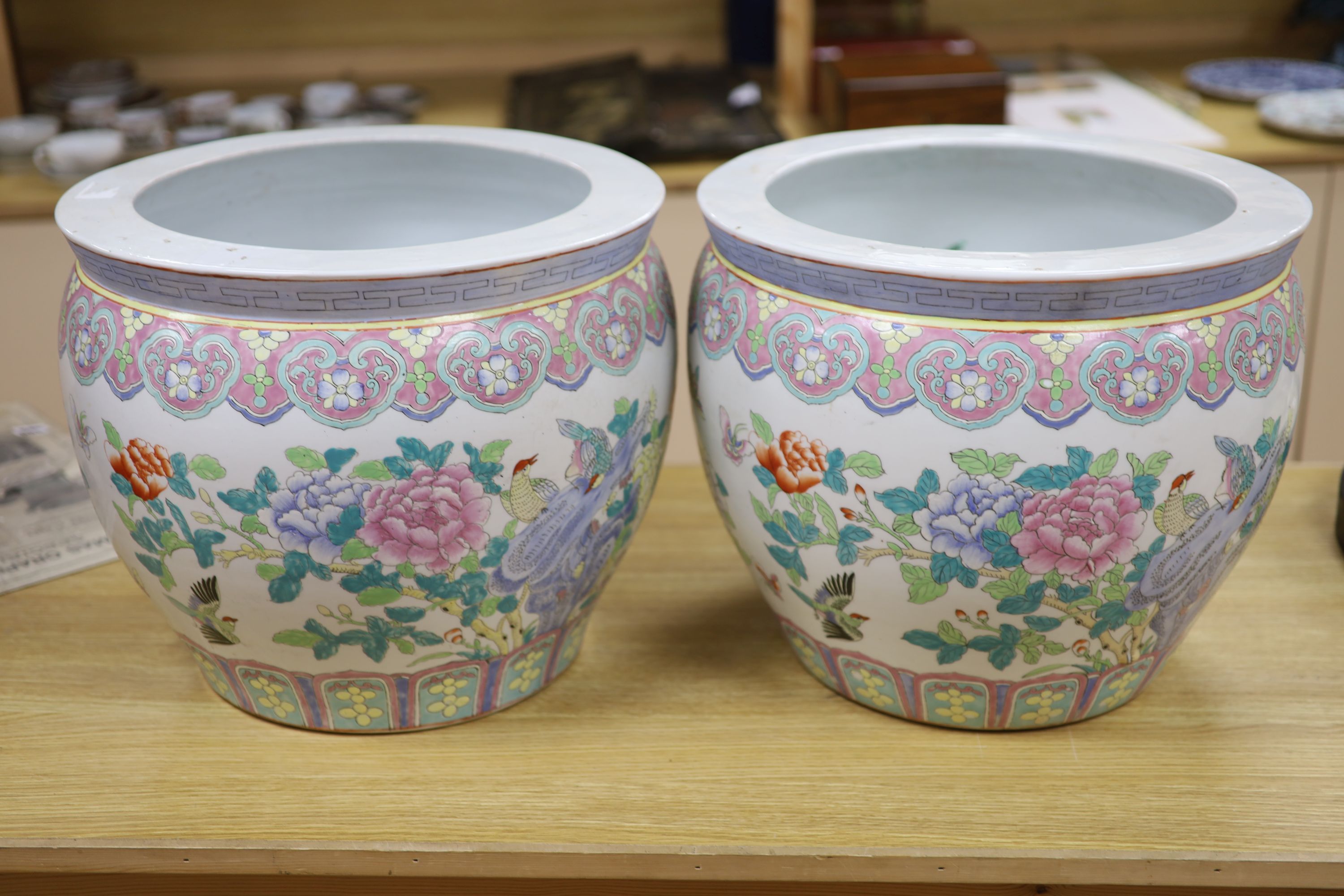 A pair of Chinese famille rose jardinieres, diameter 41cm